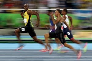 Usain Bolt wins the 100 meter race at the Olympics. (Cameron Spencer/Getty Images)