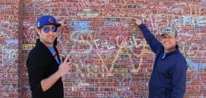 Fans outside Wrigley Field where the names of generations of Cubs faithful are listed. (AP photo)