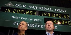 The deficit clock: both sides have thrown in the towel