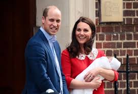 The Duke and Duchess of Cambridge with Prince Louis. How can she look this good? (AP Photo)